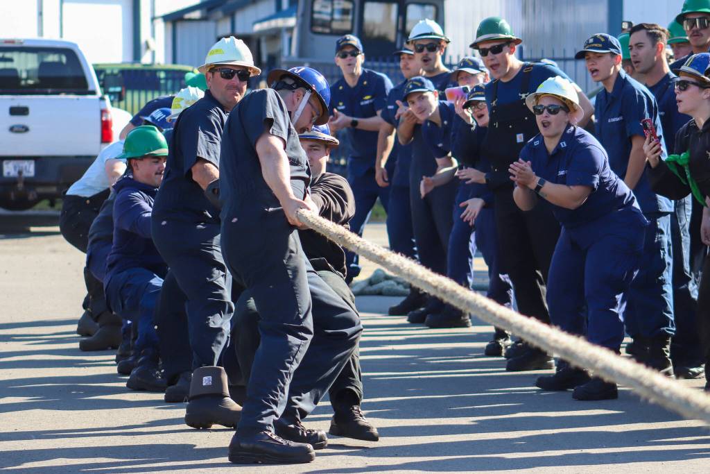 U.S. Coast Guard members participate in tug-of-war on Wednesday, one of the training exercises conducted during the annual Buoy Tender Olympics. (Jasz Garrett / Juneau Empire)