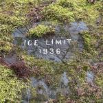 One of several ice limit signs chiseled into bedrock on the Trail of Time behind Mendenhall Glacier Visitor Center. The original signs were created on wood by the Civilian Conservation Corps in the 1930s. (Laurie Craig / Juneau Empire)
