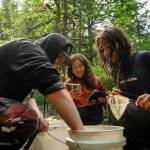 Crew members with the Hoonah Native Forest Partnership map anadromous streams that have not previously been documented in an effort to further knowledge about salmon distribution and health in Southeast Alaska that is essential for addressing climate change. (Photo by Lee House)