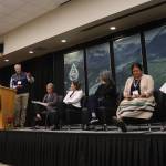 Robert Sisson (left), former commissioner of the International Joint Commission, presides over a panel discussion Wednesday during the third annual Transboundary Mining Conference at Elizabeth Peratrovich Hall. (Mark Sabbatini / Juneau Empire)
