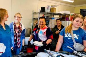 Kueni Maake, Ofeina Kivalu, Jaime and Alanna Zellhuber, Aubrey Neuffer and Mary Fitzgerald of the Church of Jesus Christ of Latter-day Saints in Juneau serve meals to those affected by this months flooding of the Mendenhall River. (Photo provided by the Church of Jesus Christ of Latter-day Saints in Juneau)