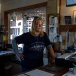 Glorianne Wollen, harbormaster, in Petersburg on Aug. 16, 2024. Over the last few years, the $6 billion Alaskan wild seafood market has been ensnared in a mix of geopolitics, macroeconomics, changing ocean temperatures and post-Covid whiplash that piled on top of long-building vulnerabilities in the business model. (Ash Adams/The New York Times)