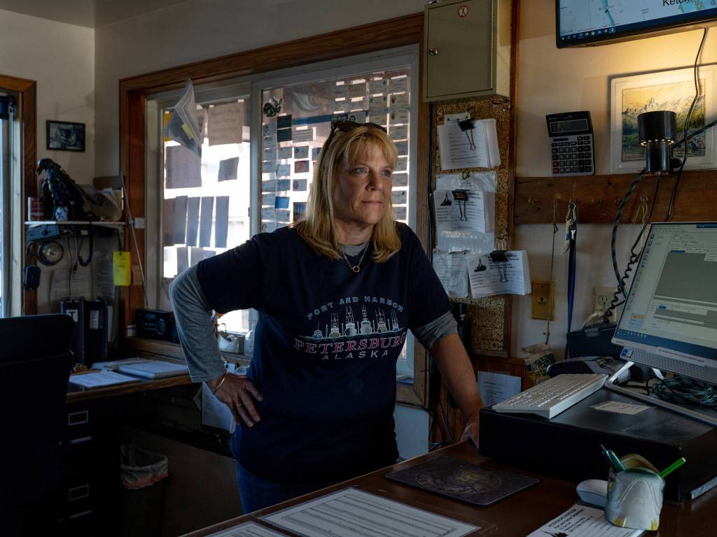 Glorianne Wollen, harbormaster, in Petersburg on Aug. 16, 2024. Over the last few years, the $6 billion Alaskan wild seafood market has been ensnared in a mix of geopolitics, macroeconomics, changing ocean temperatures and post-Covid whiplash that piled on top of long-building vulnerabilities in the business model. (Ash Adams/The New York Times)