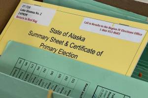 A summary sheet is seen during ballot review on Tuesday, Aug. 27, 2024, at the headquarters of the Alaska Division of Elections in Juneau. (James Brooks/Alaska Beacon)