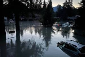 Cars and homes flooded by the break of Suicide Basins ice dam in August. (Alaska Division of Homeland Security and Emergency Management photo)