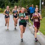 Mary Bell races in the season-opening cross country meet at the state fairgrounds in Haines on Aug. 31, 2024. (Lex Treinen / For the Chilkat Valley News)
