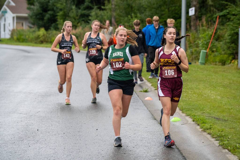 Mary Bell races in the season-opening cross country meet at the state fairgrounds in Haines on Aug. 31, 2024. (Lex Treinen / For the Chilkat Valley News)