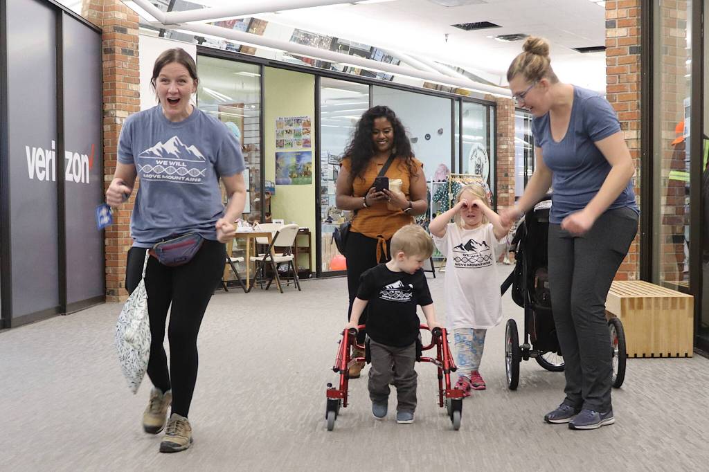 Cade Jobsis, 3, and his mother Emma (right) are joined by supporters during a walkathon on Saturday at the Mendenhall Mall to raise funds for a rare genetic disorder Cade has. (Mark Sabbatini / Juneau Empire)