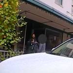 A woman talks to Steven Kissack, defying orders by police not to do so, during a confrontation on Front Street on July 15. (Screenshot from JPD bodycam video)