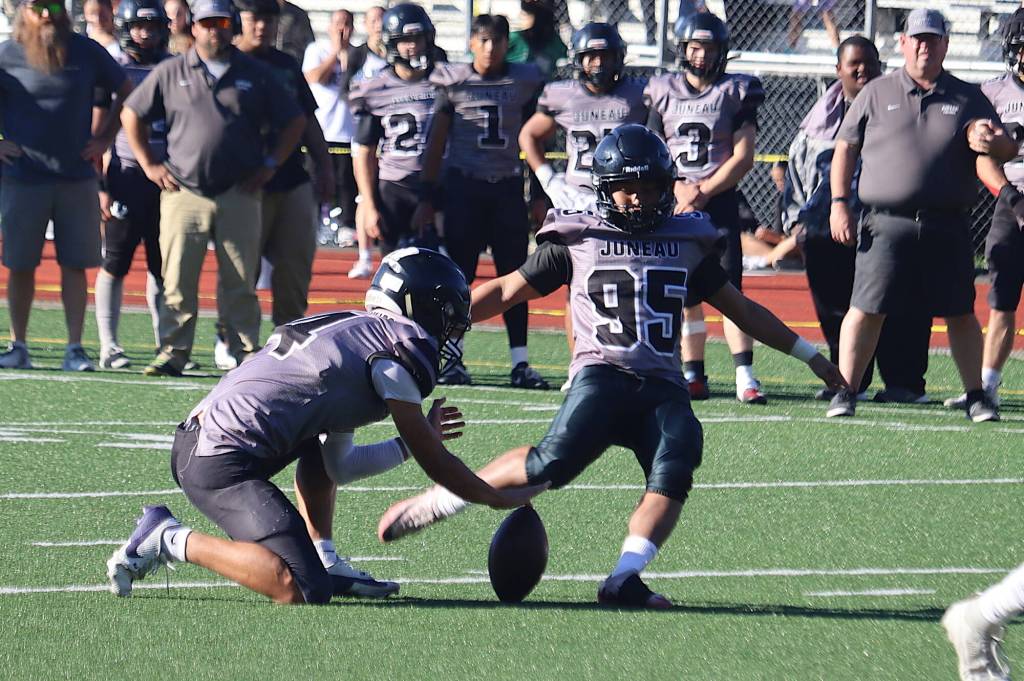 Sammy Mazon, a recent addition to the Juneau Huskies playing in his second game, kicks a 29-yard field goal during the first half of Saturdays game against West Anchorage High School at Adair-Kennedy Memorial Park. (Mark Sabbatini / Juneau Empire)
