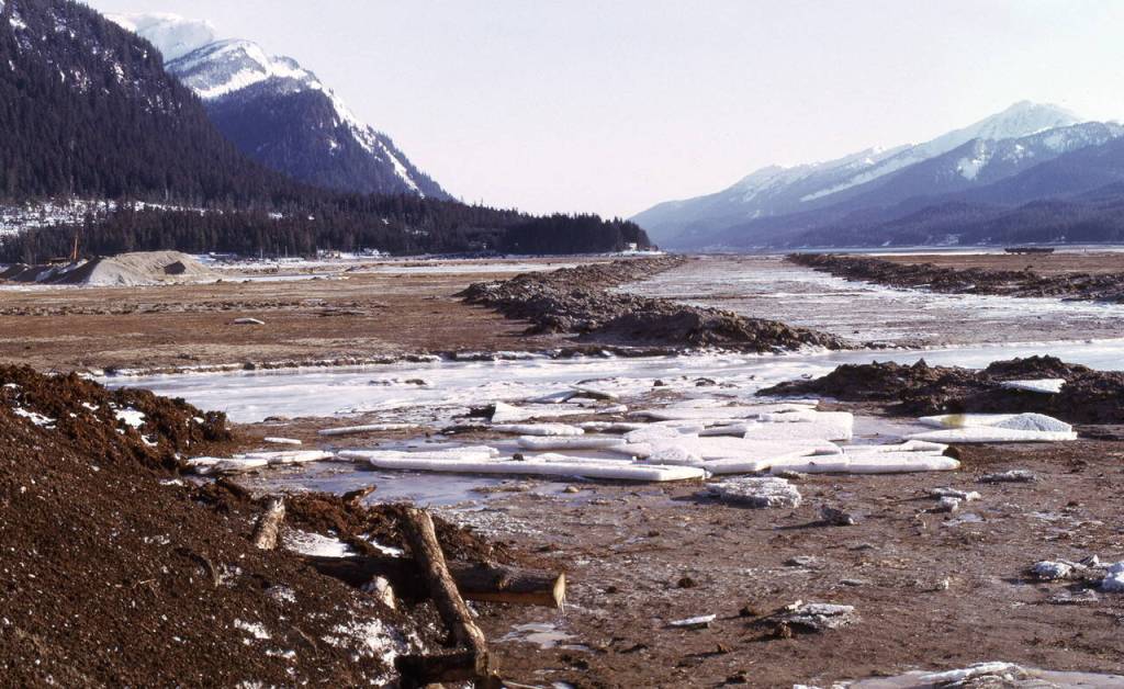Egan Drive was constructed with rock berms filled with dredged material from Gastineau Channel, seen here near Lemon Creek in March of 1973. (Photo by Skip Gray)