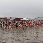 More than 125 high school students head out from the starting line in the boys 5K race at the Capital City Invite on Saturday at Savikko Park. (Mark Sabbatini / Juneau Empire)