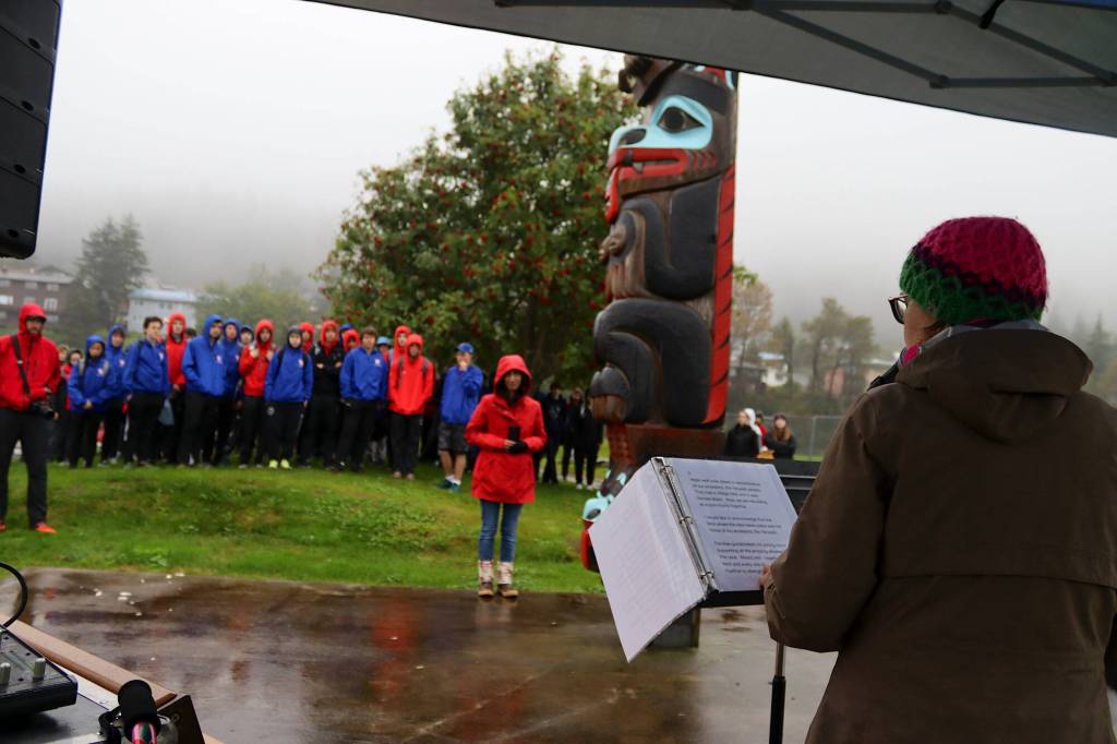 Kitty Eddy, a retired longtime Tlingit language educator, offers the land acknowledgement before the Capital City Invite at Savikko Park on Saturday morning. (Mark Sabbatini / Juneau Empire)