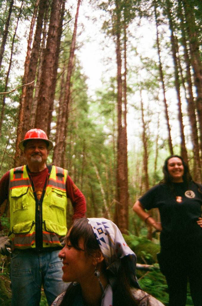 Bob Girt, Clara Mooney and Sheridan Cook take a break from stream restoration work near Klawock. (Photo by Addy Mallott)