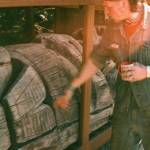 In Kasaan, carver Eric Hamar points to where a recently returned totem had been struck by lightning due to a metal pole inserted in its core. (Photo by Addy Mallott)