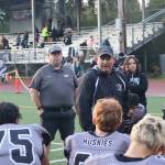 Juneau Huskies Head Coach Rich Sjoroos talks to his players after Saturdays game against Bartlett High School at Adiar-Kennedy Memorial Park. (Mark Sabbatini / Juneau Empire)