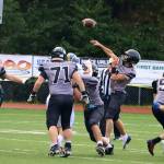 Jayden Johnson (4) throws a pass for Juneau-Douglas High School: Yadaa.at Kalé in the first quarter of Saturdays game against Bartlett High School at Adair-Kennedy Memorial Park. Johnson, a senior wide receiver, played nearly the entire game at quarterback. (Mark Sabbatini / Juneau Empire)