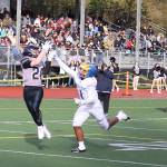 Juneaus Kurt Kuppert (20) catches a 30-yard touchdown pass from Jayden Johnson during the first half of Saturdays game against Bartlett High School at Adair-Kennedy Memorial Park. (Mark Sabbatini / Juneau Empire)