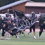 The Juneau Huskies enter the field for the second half leading Bartlett High School 20-8 in Saturdays game at Adair-Kennedy Memorial Park. (Mark Sabbatini / Juneau Empire)