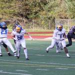 Bartlett High Schools Andre Jameson (1) takes a fumble he recovered at his teams 5-yard line the length of the field for a touchdown during Saturdays game against Juneau-Douglas High School: Yadaa.at Kalé at Adair-Kennedy Memorial Park. (Mark Sabbatini / Juneau Empire)
