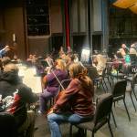 Dwayne Corbin, one of four candidates to become the new music director of the Juneau Symphony, conducts the orchestra during a rehearsal Tuesday for this weekends concerts at Juneau-Douglas High School: Yadaa.at Kalé. (Mark Sabbatini / Juneau Empire)