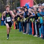 Craig sophomore Aulis Nelson (170) sprints to the championship of the Division III boys 2024 ASAA cross-country running state championships Saturday on the Bartlett High School Trails in Anchorage. (Klas Stolpe / Juneau Empire)