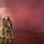 Haines fire chief Brian Clay talks to another firefighter on Saturday, Oct. 5, 2024, in Haines. (Rashah Mcchesney/Chilkat Valley News)