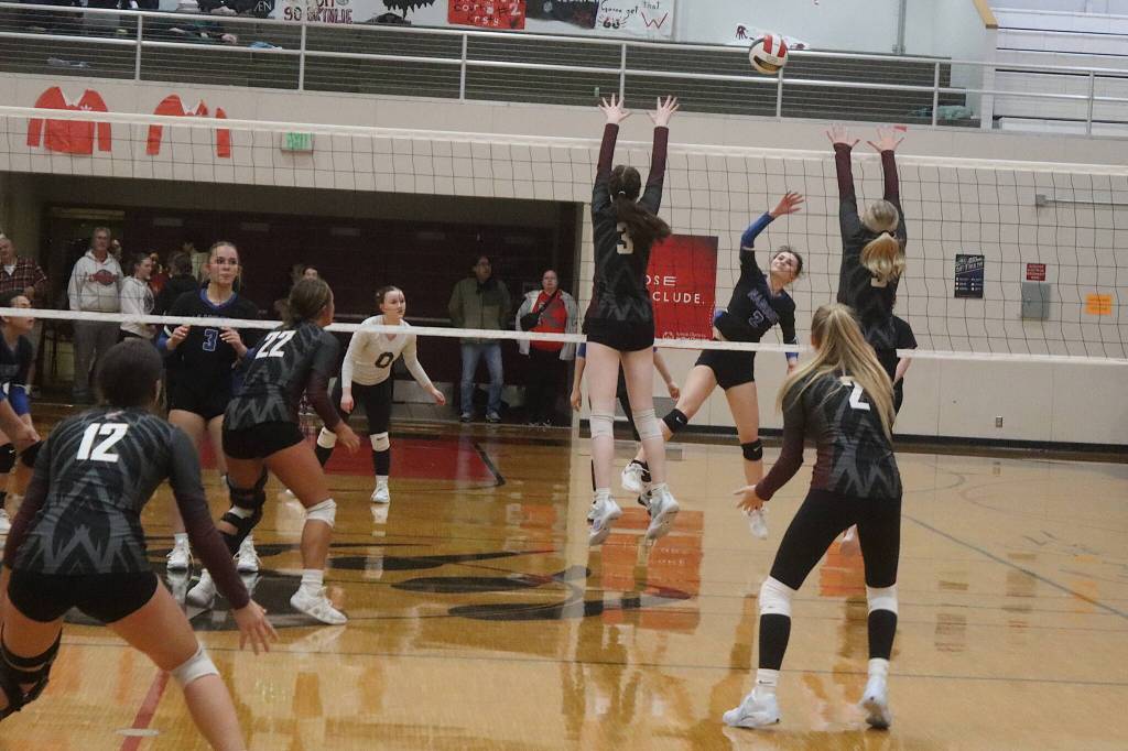 Ketchikan High School and Nome-Beltz Middle High School face off in a Silver Bracket elimination game during the Juneau Invitational Volleyball Extravaganza at JDHS on Saturday. (Mark Sabbatini / Juneau Empire)