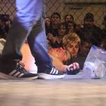 Colin Rose gets medical assistance after being slammed to the floor during his MMA fight against Damian Trujillo at AK Beatdown 36 on Saturday night at Elizabeth Peratrovich Hall. (Mark Sabbatini / Juneau Empire)