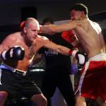 Tyson Duckworth (left) and Marco Reina face off in the main event at AK Beatdown 36 on Saturday night at Elizabeth Peratrovich Hall. (Mark Sabbatini / Juneau Empire)
