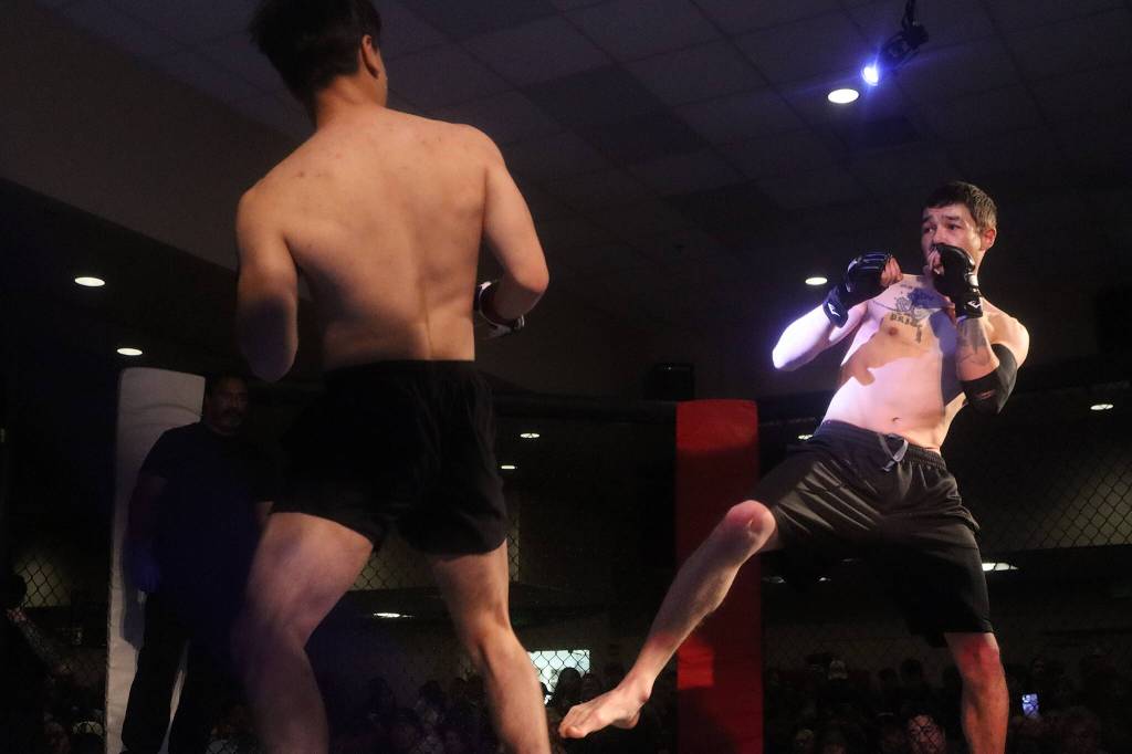 Colin Jack and Thomas James face off in an MMA bout during AK Beatdown 36 on Saturday night at Elizabeth Peratrovich Hall. (Mark Sabbatini / Juneau Empire)