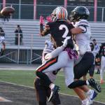 Juneau Huskies senior Sage Schultz and senior Jayden Johnson break up a pass to West Anchorage senior Ariel Sanchez (2) during the Huskies 20-13 loss to the Eagles in the 2024 ASAA State Football Playoffs on Saturday at West Anchorages Nest on Hillcrest. (Klas Stolpe/Juneau Empire)