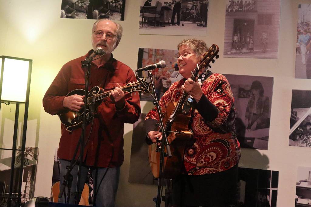 Greg Burger and Mary DeSmet perform a set of folk songs during KTOOs 50-Fest on Saturday night at the Juneau Arts and Culture Center. (Mark Sabbatini / Juneau Empire)