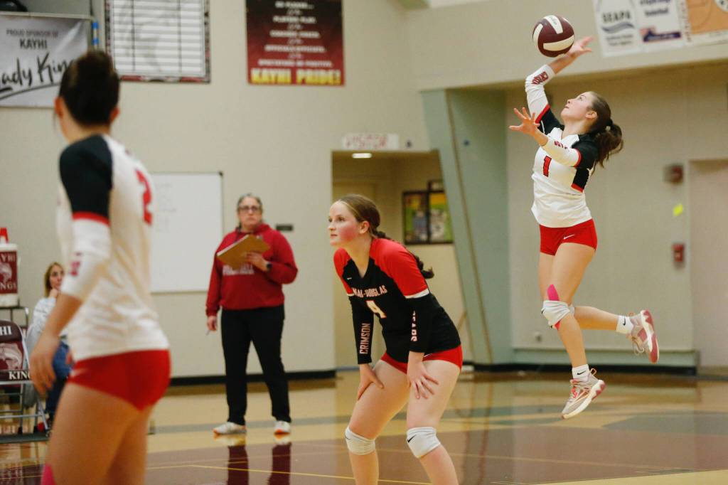 Juneau-Douglas High School: Yadaa.at Kalés June Troxel serves the ball during their 25-19, 25-16, 25-15 victory over Ketchikan High School at the Clarke Cochrane Gymnasium on Saturday, Oct. 12, 2024. (Christopher Mullen/ Ketchikan Daily News)