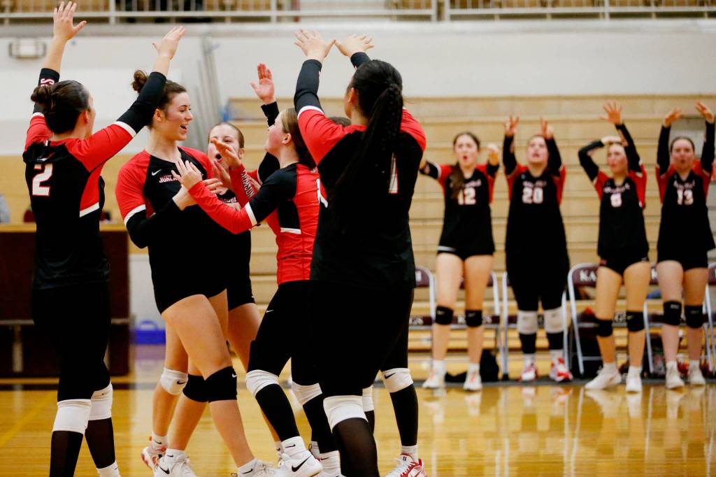 Juneau-Douglas High School: Yadaa.at Kalés team celebrates after scoring a point during their 25-15, 25-21, 25- 18 victory over Ketchikan High School at the Clarke Cochrane Gymnasium on Friday, Oct. 11, 2024. (Christopher Mullen/ Ketchikan Daily News)