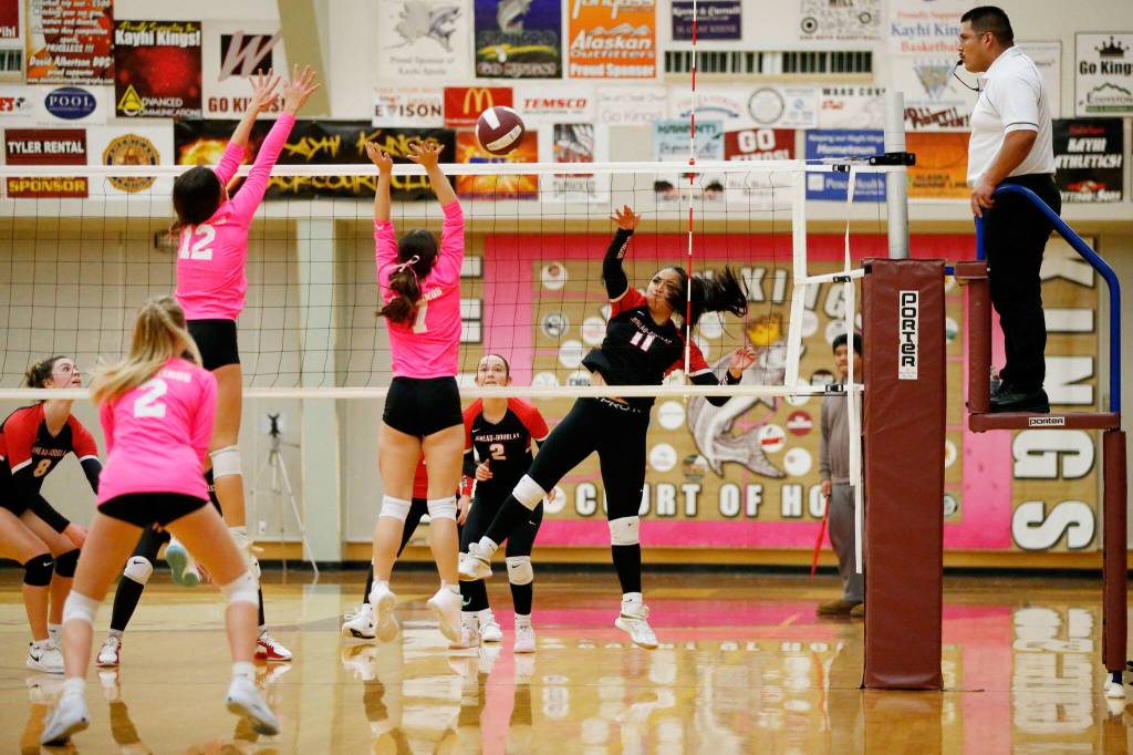 Juneau-Douglas High School: Yadaa.at Kalés Lavinia MaAke hits the ball during their 25-15, 25-21, 25- 18 victory over Ketchikan High School at the Clarke Cochrane Gymnasium on Friday, Oct. 11, 2024. (Christopher Mullen/ Ketchikan Daily News)
