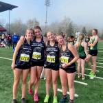 Members of the Juneau-Douglas High School: Yadaa.at Kalé cross-country team pose for a photo while attending the Nike Hole In The Wall XC Invitational at Lakewood High School in Washington. (Photo courtesy JDHS Cross-Country)