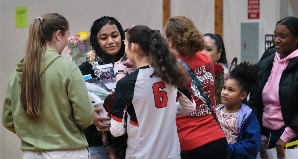 Juneau-Douglas High School: Yadaa.at Kalé volleyball senior Valinilia Mausia is honored before Friday nights game against Wasilla at the George Houston Gymnasium. (Klas Stolpe/Juneau Empire)