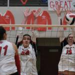 Juneau-Douglas High School: Yadaa.at Kalé junior Natalia Harris (20) and sophomore Amelia Effers (13) attempt to block a shot by Wasilla junior Ki Schachle (11) on Friday. (Klas Stolpe/Juneau Empire)