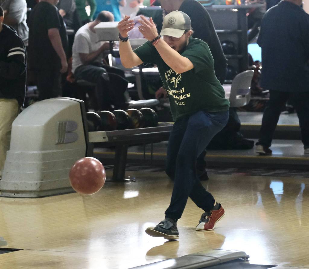 Keehan Lee delivers his ball during the Juneau Special Olympics bowling games Sunday at Pinz Bowling Alley. (Klas Stolpe/Juneau Empire)