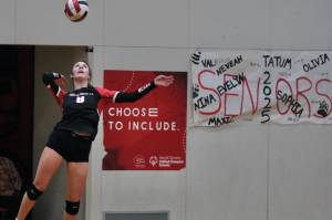 JDHS senior Evelyn Richards (8) serves against Wasilla last weekend. The Crimson Bears fell at East Anchorage on Thursday and will play in the Dimond/Service Tournament on Friday and Saturday. (Klas Stolpe / Juneau Empire file photo)