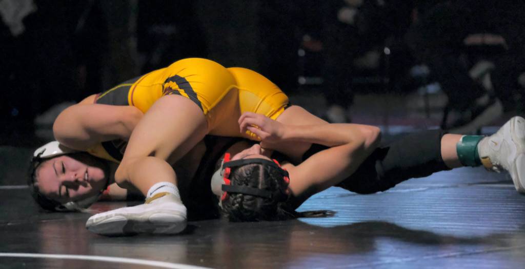 Hoonah senior Krista Howland pins Wrangell senior Della Churchill in the girls 126-pound championship on Saturday at the Southeast Showdown Wrestling Tournament in Juneaus George Houston Gymnasium. (Klas Stolpe / Juneau Empire)