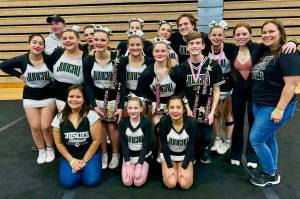 The Juneau Huskies competition cheer team pose for a photo at last weekends 2024 Rally in the Valley Cheer Competition at Palmers Colony High School. Back row left to right: Assistant coach Rob Day, Savannah Cornett Markey, Avery Cornett Markey, Marzena Whitmore, Kajson Cunningham, Gracie Kohuth, assistant coach Katelyn Kohuth and head coach Stephany Day. Middle row l-r: Faith Montez, Rylie Mulkey, Ayla Keller, Tenlee Roemer, Samantha Day and Elijah Levy. Front row l-r: Assistant coach Vanessa Aube, Rory Love and Viviana Flores. (Photo courtesy Samantha Day).