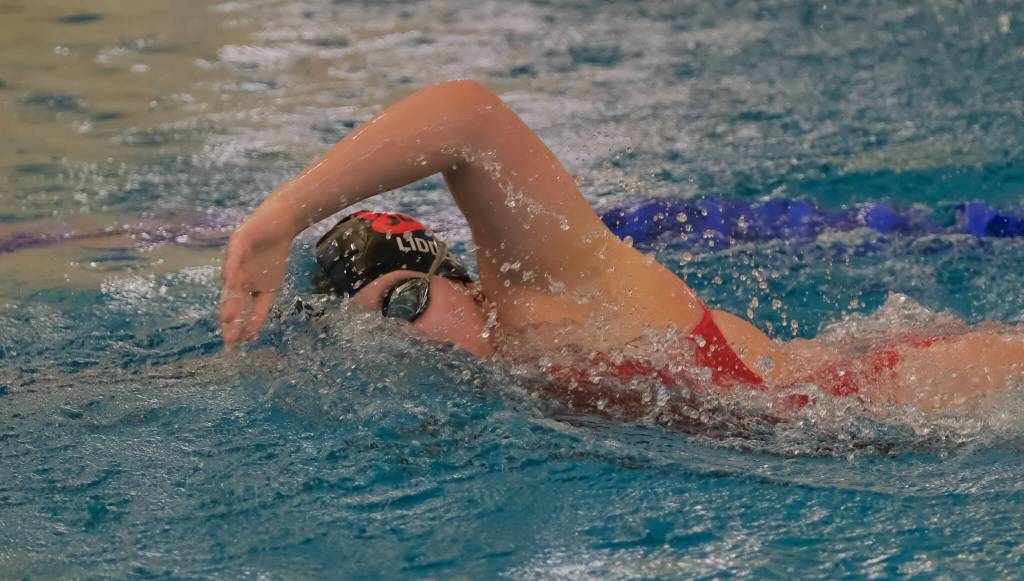 Juneau-Douglas High School: Yadaa.at Kalé sophomore Amy Liddle swims the girls 200 yard freestyle during the 2024 Region V Swim & Dive Championships Saturday at the Petersburg Aquatic Center. (Klas Stolpe / Juneau Empire)