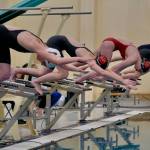 Ketchikans Myleigh Sambrano, JDHS Bailey Fisher and Deedee Mills, Petersburgs Brooklyn Whitethorn and Wrangells Johanna Sanford start the girls 100 yard freestyle during the 2024 Region V Swim & Dive Championships Saturday at the Petersburg Aquatic Center. (Klas Stolpe / Juneau Empire)