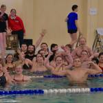 The Juneau-Douglas High School: Yadaa.at Kalé swim and dive team celebrate their weekend at the 2024 Region V Swim & Dive Championships Saturday at the Petersburg Aquatic Center. (Klas Stolpe / Juneau Empire)