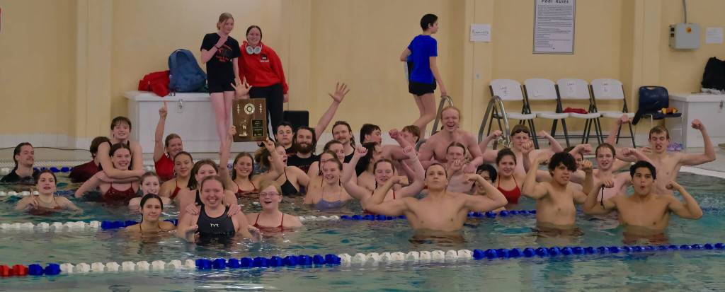 The Juneau-Douglas High School: Yadaa.at Kalé swim and dive team celebrate their weekend at the 2024 Region V Swim & Dive Championships Saturday at the Petersburg Aquatic Center. (Klas Stolpe / Juneau Empire)