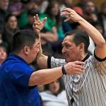 Sitka coach Jarret Harai and referee Ron Taug discuss a call during the 2019 Region V 3A Championship game in Mt. Edgecumbes B.J. McGillis Gymnasium. (Klas Stolpe / Juneau Empire)