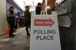 Voters at Anchorage City Hall wait in line to cast their ballots on Nov. 4, 2024, the day before Election Day. City Hall, in downtown Anchorage, was one of the designated early voting sites in the states largest city. (Yereth Rosen/Alaska Beacon)