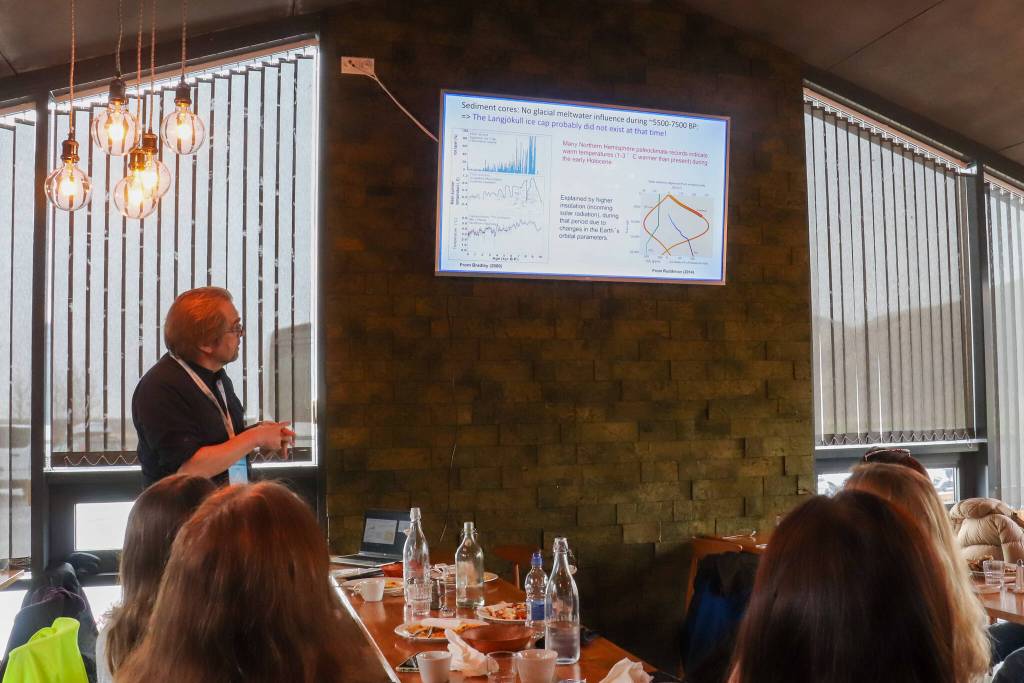 Þorsteinn Þorsteinsson gives a presentation during lunch on Oct. 20 before a glacier hike. Attendees also participated in the Arctic Circle Assembly Oct. 17 to Oct. 19.(Jasz Garrett / For the Juneau Empire)